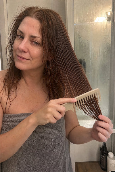 The comb goes through wet hair — week 2